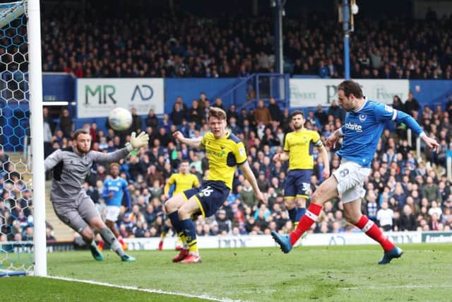 Brett Pitman scores his first goal against Oxford - from a Jamal Lowe cross. Picture: Joe Pepler