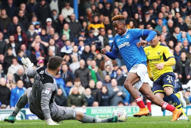 Jamal Lowe on his way to setting up Brett Pitman's second goal against Oxford. Picture: Joe Pepler