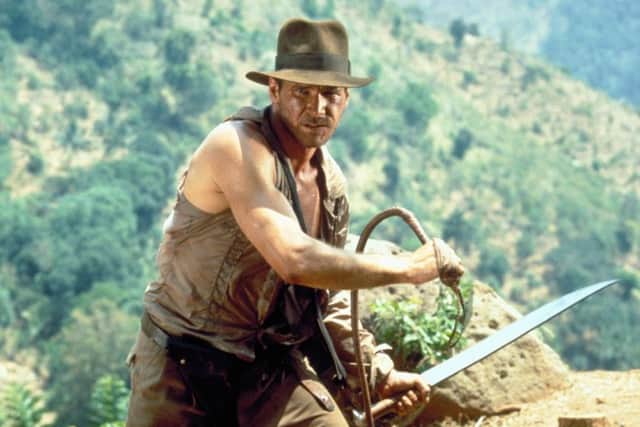 Undated Film Still handout from Indiana Jones And The Temple Of Doom. Pictured: Harrison Ford as Indiana Jones. See PA Feature FILM Cowboys. Picture credit should read: PA Photo/Lucas Film 2007. WARNING: This picture must only be used to accompany PA Feature FILM Cowboys. ENGPPP00120121007133228
