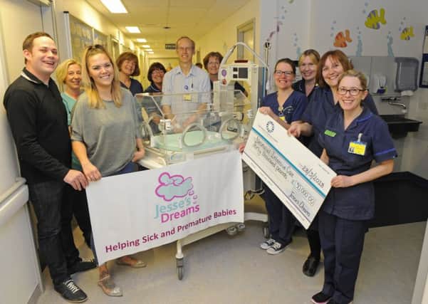 Ryan and Robyn Bendon, from Cosham, have raised Â£30,000 for the neo-natal intensive care unit at Queen Alexandra Hospital in memory of their son Jesse who died shortly after being born at 23 weeks. 
Picture: Malcolm Wells