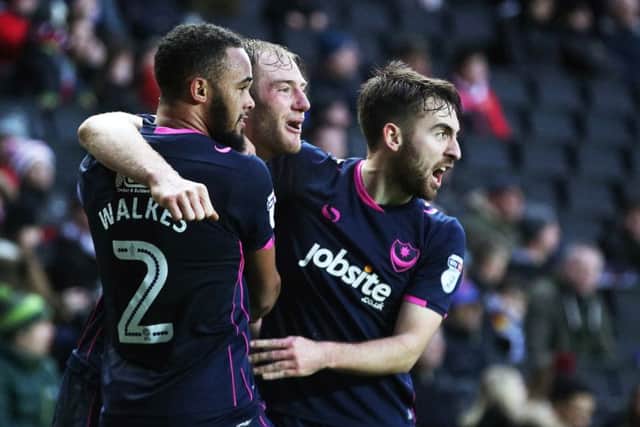 Matt Clarke celebrates scoring against MK Dons. Picture: Joe Pepler