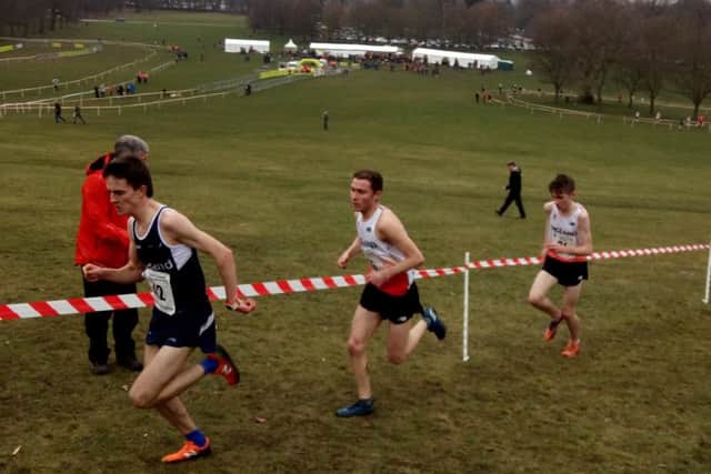 Lachlan Wellington, centre, on his way to a bronze medal in Nottingham for England