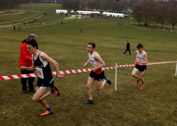 Lachlan Wellington, centre, on his way to a bronze medal in Nottingham for England