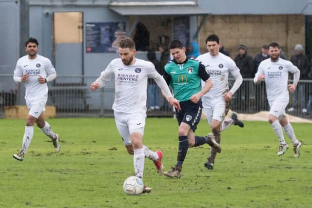 Rory Williams brings the ball forward during today's Hawks v Weston-super-Mare game at Westleigh Park Picture: Duncan Shepherd