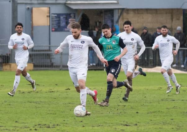 Rory Williams brings the ball forward during today's Hawks v Weston-super-Mare game at Westleigh Park Picture: Duncan Shepherd