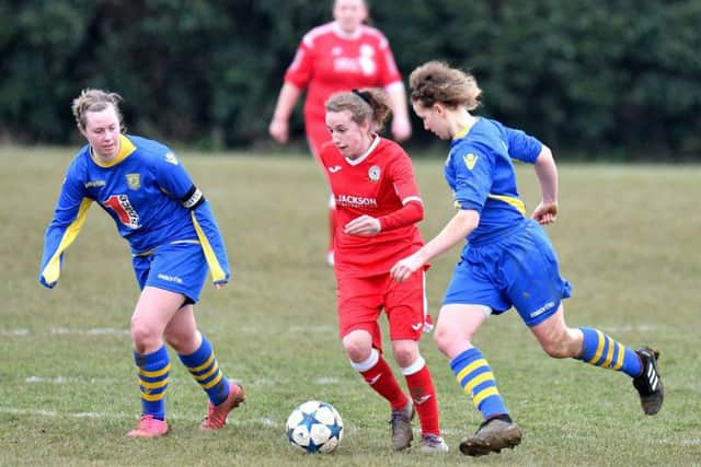 Action from Horndean, red, against Basingtoke Town at Five Heads Park. Picture: Neil Marshall (171745-547)