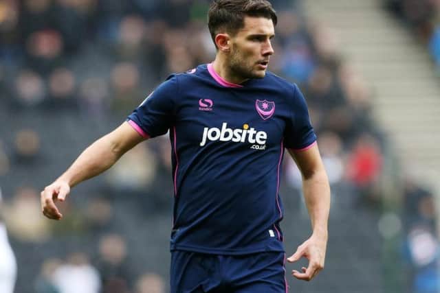Gareth Evans returns to Pompey's starting line-up at Walsall.