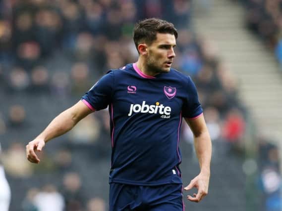 Gareth Evans returns to Pompey's starting line-up at Walsall.