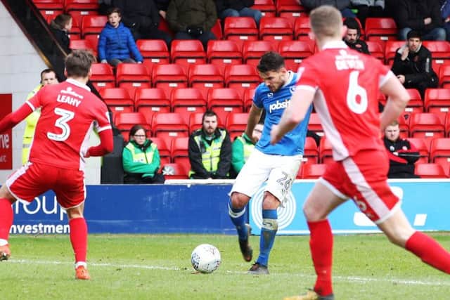 Gareth Evans scores Pompey's winner against Walsall Picture: Joe Pepler