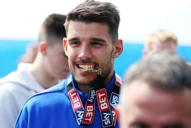 Gareth Evans was surprised to see Paul Cook leave Pompey just days after clinching the League Two crown. Picture: Joe Pepler