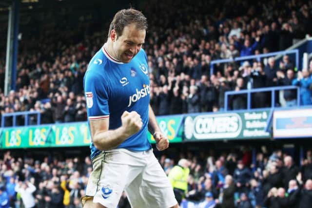 Brett Pitman celebrates his 20th goal of the season, which came against Wigan on Monday. Picture: Joe Pepler