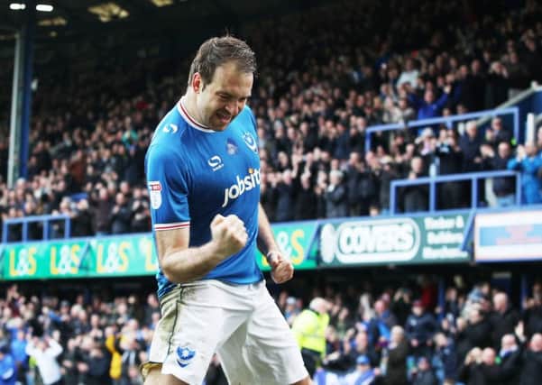 Brett Pitman celebrates his 20th goal of the season, which came against Wigan on Monday. Picture: Joe Pepler