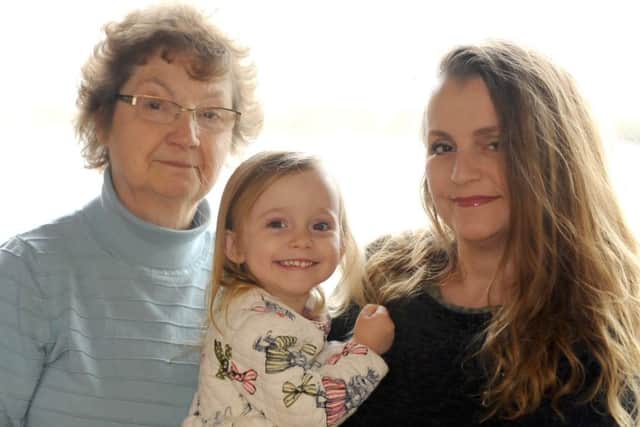 Rachel Ballard at home in Emsworth with her mother Sheila Ballard and daughter Georgiana Picture: Malcolm Wells (180330-9329)