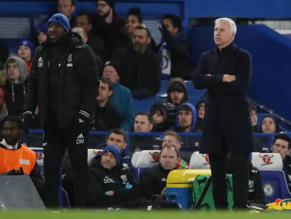 Darren Moore, left, and Alan Pardew. Picture: Nick Potts/ PA Images
