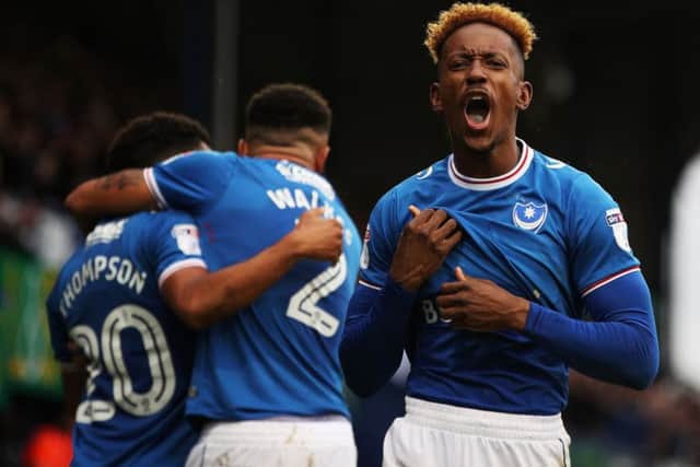 Jamal Lowe leads the celebrations after his goal. Picture: Joe Pepler