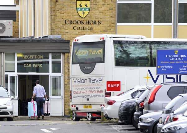 Pupils have arrived back at Crookhorn College after falling ill on a trip to America. Picture by Malcolm Wells