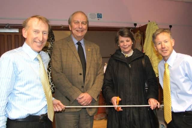Brothers Martin and Jeremy Holmes (far left and far right) open their charity Easter market with Mick Lyons, Rocky Appeal co-ordinator, and Melloney Poole, chairman of Portsmouth Hospitals NHS Trust