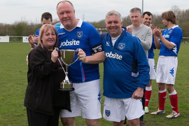Ex-Pompey players Guy Butters and Tony Male with Lee Rigby's mum Lyn. Picture: Simon Hill
