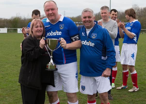 Ex-Pompey players Guy Butters and Tony Male with Lee Rigby's mum Lyn. Picture: Simon Hill