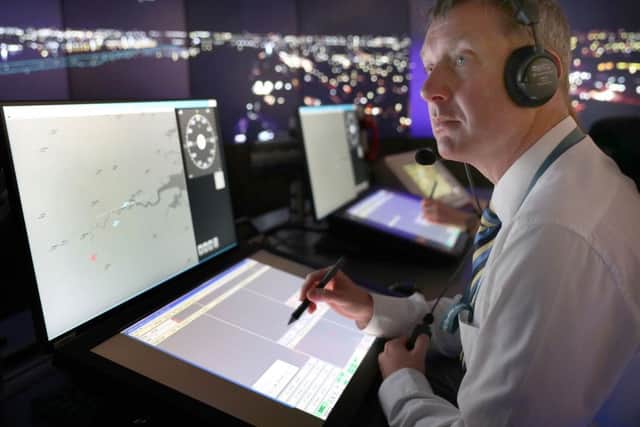 NATS personnel give a demonstration in the operations room at National Air Traffic Services (NATS) Swanwick in Hampshire, which will direct aircraft at London City Airport using the UK's first remote digital air traffic control tower. Photo: Andrew Matthews/PA Wire