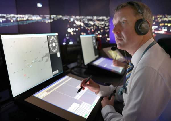 NATS personnel give a demonstration in the operations room at National Air Traffic Services (NATS) Swanwick in Hampshire, which will direct aircraft at London City Airport using the UK's first remote digital air traffic control tower. Photo: Andrew Matthews/PA Wire