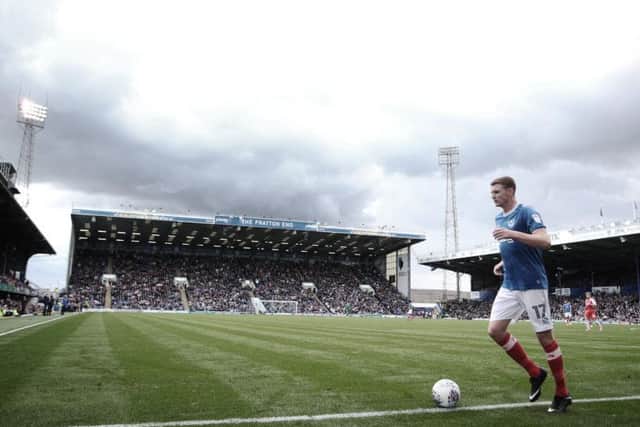 Dion Donohue goes to take a corner at Fratton Park earlier in the season against Fleetwood. Picture: Joe Pepler