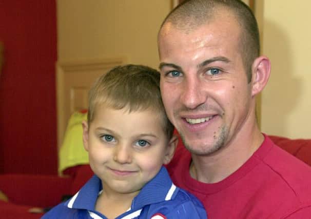 Dave Waterman, pictured with his son Oakley, who died in 2005