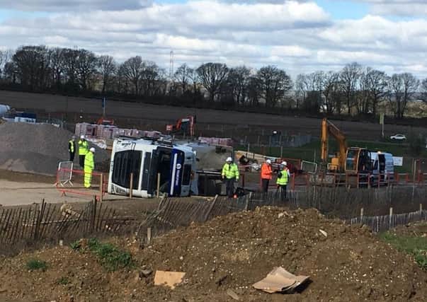 Fire crews rescued a man from an overturned lorry at a housing development in Waterlooville on April 5. Picture: Tom Cotterill