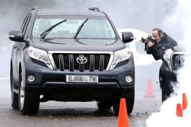 One of the CPU in a firefight during a demonstation. PHOTO: Andrew Mathews/PA Wire