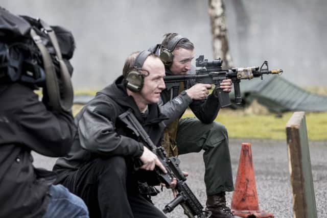 The team return fire during an intense exercise at Longmoor  PHOTO: Habibur Rahman