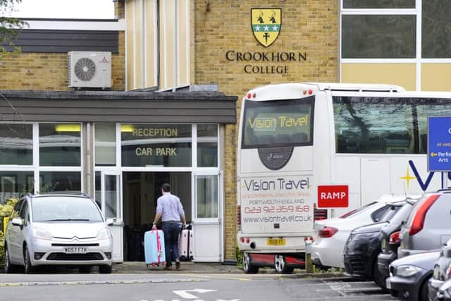 Pupils arriving back to Crookhorn College in Stakes Hill Road,  after their trip to the USA 



Picture:  Malcolm Wells