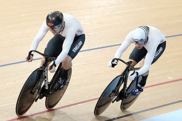 Joe Truman, right, in action in the team sprint at the Commonwealth Games