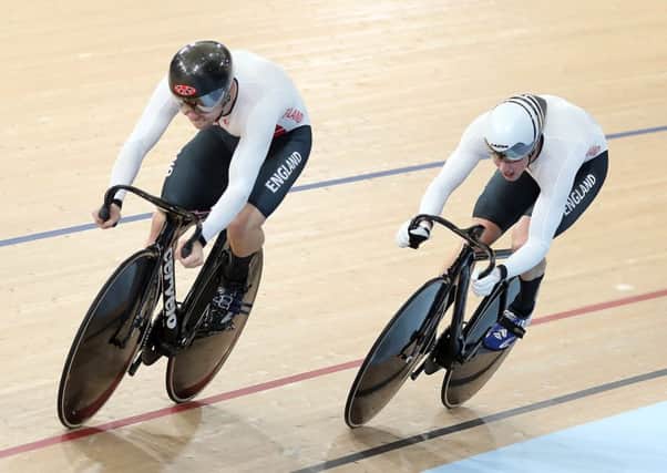Joe Truman, right, in action in the team sprint at the Commonwealth Games