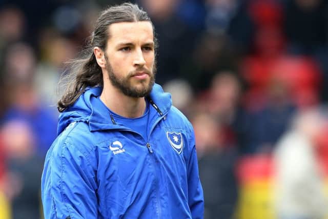 Christian Burgess has had to make do with a spot on the bench in recent games. Picture: Joe Pepler
