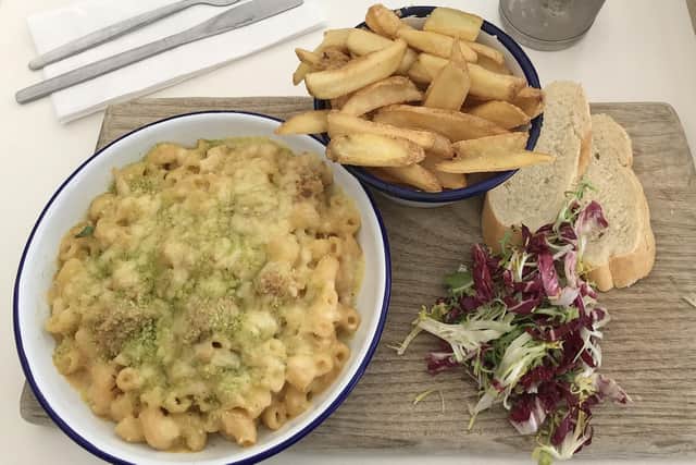 The crab mac 'n' cheese, enjoyed with a side of rustic fries and a shameless brownie shake