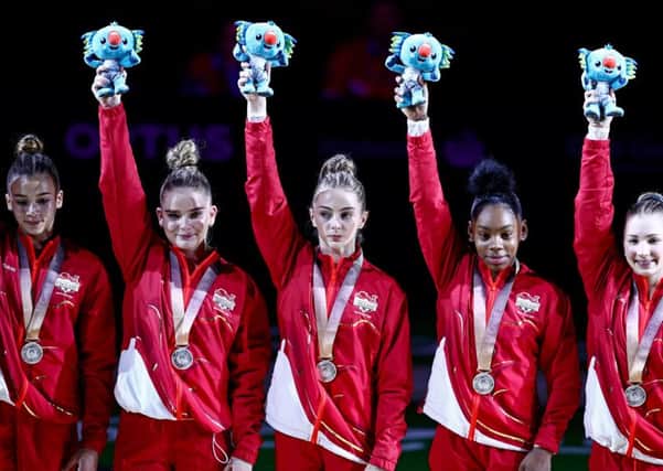 England's team of Kelly Simm, Lucy Stanhope, Georgia-Mae Fenton, Alice Kinsella, Taeja James celebrate Silver in the Women's Team Final at the Coomera Indoor Sports Centre during day two of the 2018 Commonwealth Games in the Gold Coast, Australia. Picture: Danny Lawson/ PA Wire