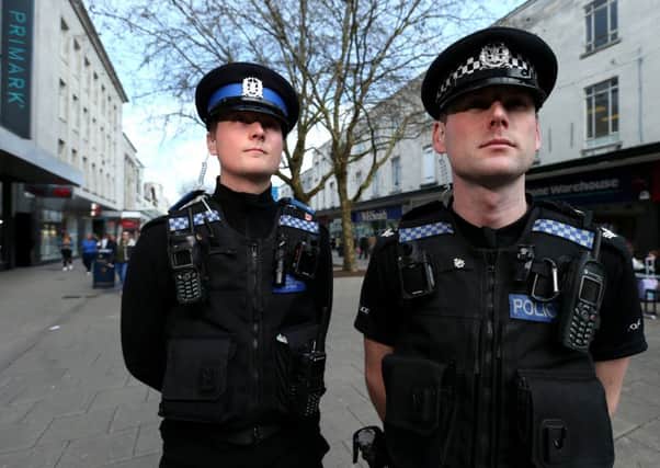 Acting Sgt Dan McGarrigle, right, and PCSO Hayden Alderson on patrol in Portsmouth city centre