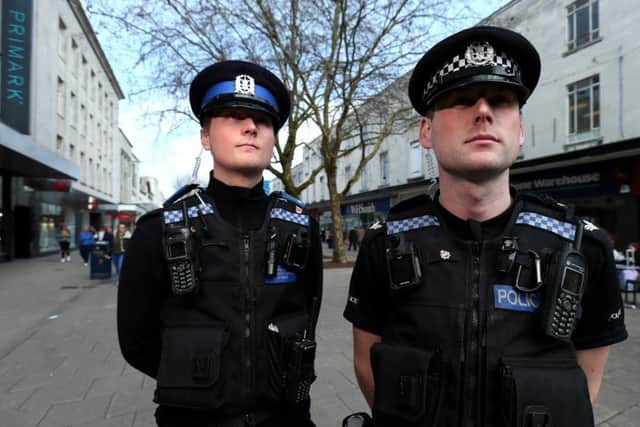 Acting Sgt Dan McGarrigle, right, and PCSO Hayden Alderson on patrol in Portsmouth city centre