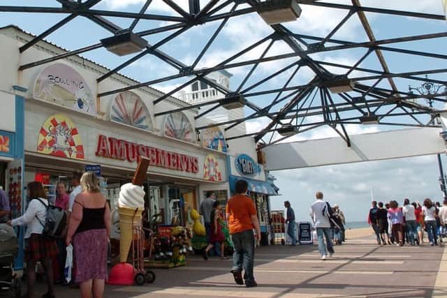Martin Davies videoed three women, including one who was holding her child at South Parade Pier arcades