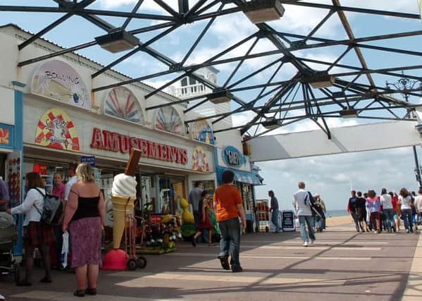 Martin Davies videoed three women, including one who was holding her child at South Parade Pier arcades