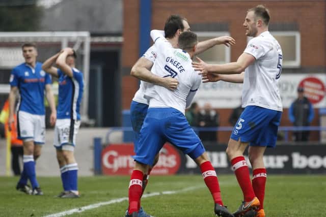 Pompey celebrate after Rochdale concede an own goal to make the score 3-3. Picture: Daniel Chesterton/phcimages.com