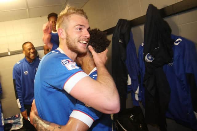 Jack Whatmough celebrates promotion at Notts County last season. Picture: Joe Pepler
