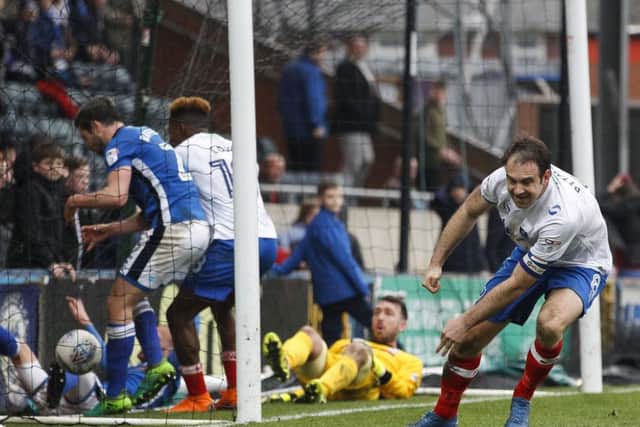 Brett Pitman heads for the halfway line after Pompey's third goal at Rochdale. Picture: Daniel Chesterton