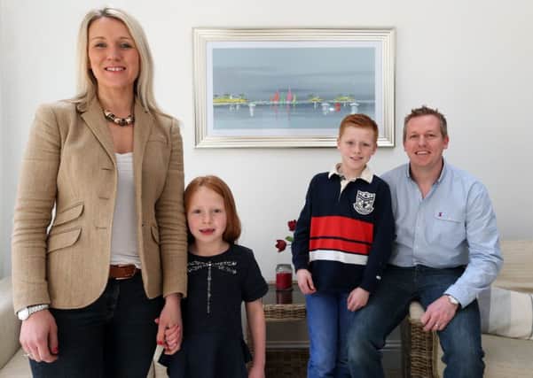 The Burns family, Natalie and Richard with Oliver , nine, and Alexis, six, pictured at home in Park Gate. Natalie is recovering from a stroke and wants to warn readers about how to spot the first signs of one            Picture: Chris Moorhouse