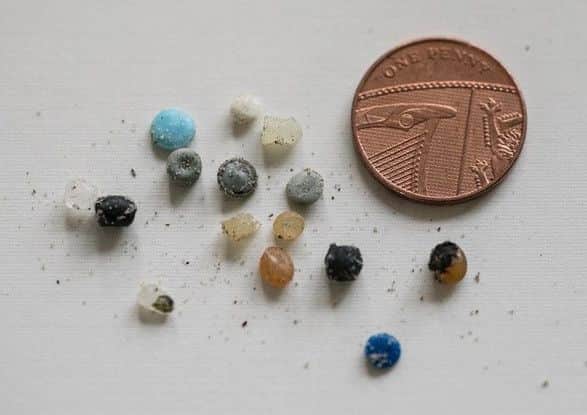 Nurdles collected from the Hayling coast, compared to the size of a coin. Credit: Confetti Coast Photography