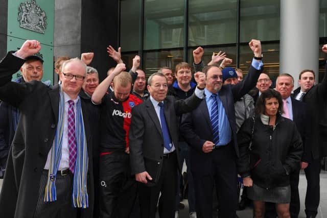 Members of the Pompey Supporters' Trust at The Rolls Building in London. Picture: Sarah Standing (13980-8286)