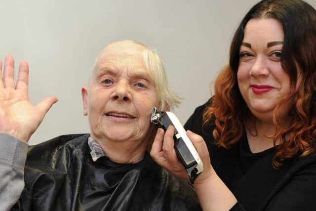 Hairdresser Michelle Winterbottom shaves Janet Monroe's hair for charity. Picture by Ian Hargreaves