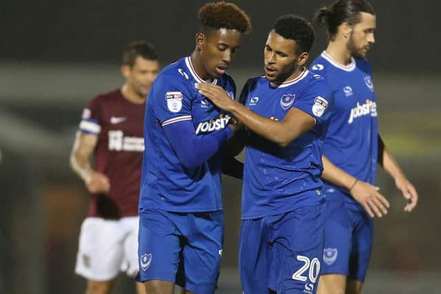 Nathan Thompson and Jamal Lowe. Picture: Joe Pepler
