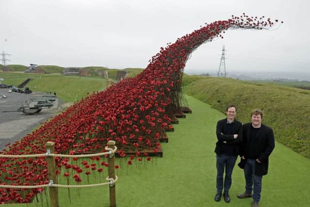 A new poppy installation called The Wave has been unveiled at Fort Nelson. Designer Tom Piper, left, and artist Paul Cummins.Picture Ian Hargreaves  (180452-1)