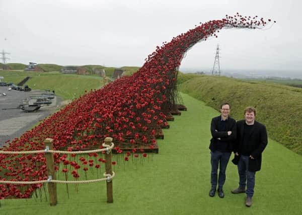 A new poppy installation called The Wave has been unveiled at Fort Nelson. Designer Tom Piper, left, and artist Paul Cummins.
Picture Ian Hargreaves  (180452-1)